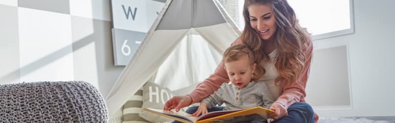 A Single Mother by Choice reading to her child A Single Mother by Choice reading to her child
