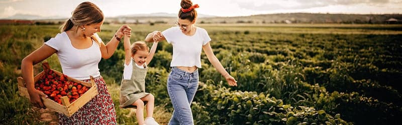 Lesbian mothers with their child conceived with the help of a sperm donor Lesbian mothers with their child conceived with the help of a sperm donor