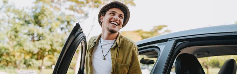 Sperm donor smiling after getting out of a car Sperm donor smiling after getting out of a car