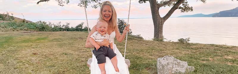 Annmaree on a swing with her son Annmaree on a swing with her son