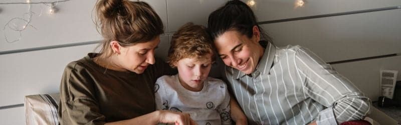 Lesbian family in bed Lesbian family in bed