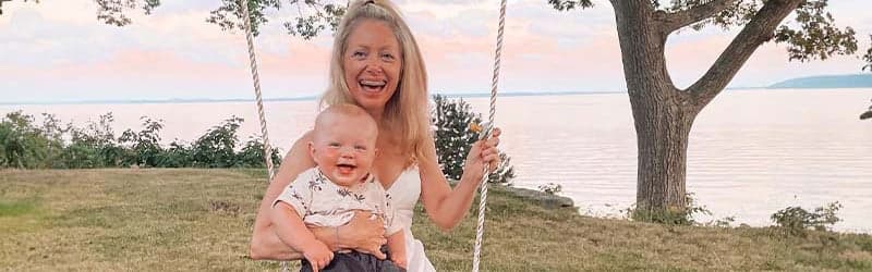 Annmaree on a swing with her son Annmaree on a swing with her son