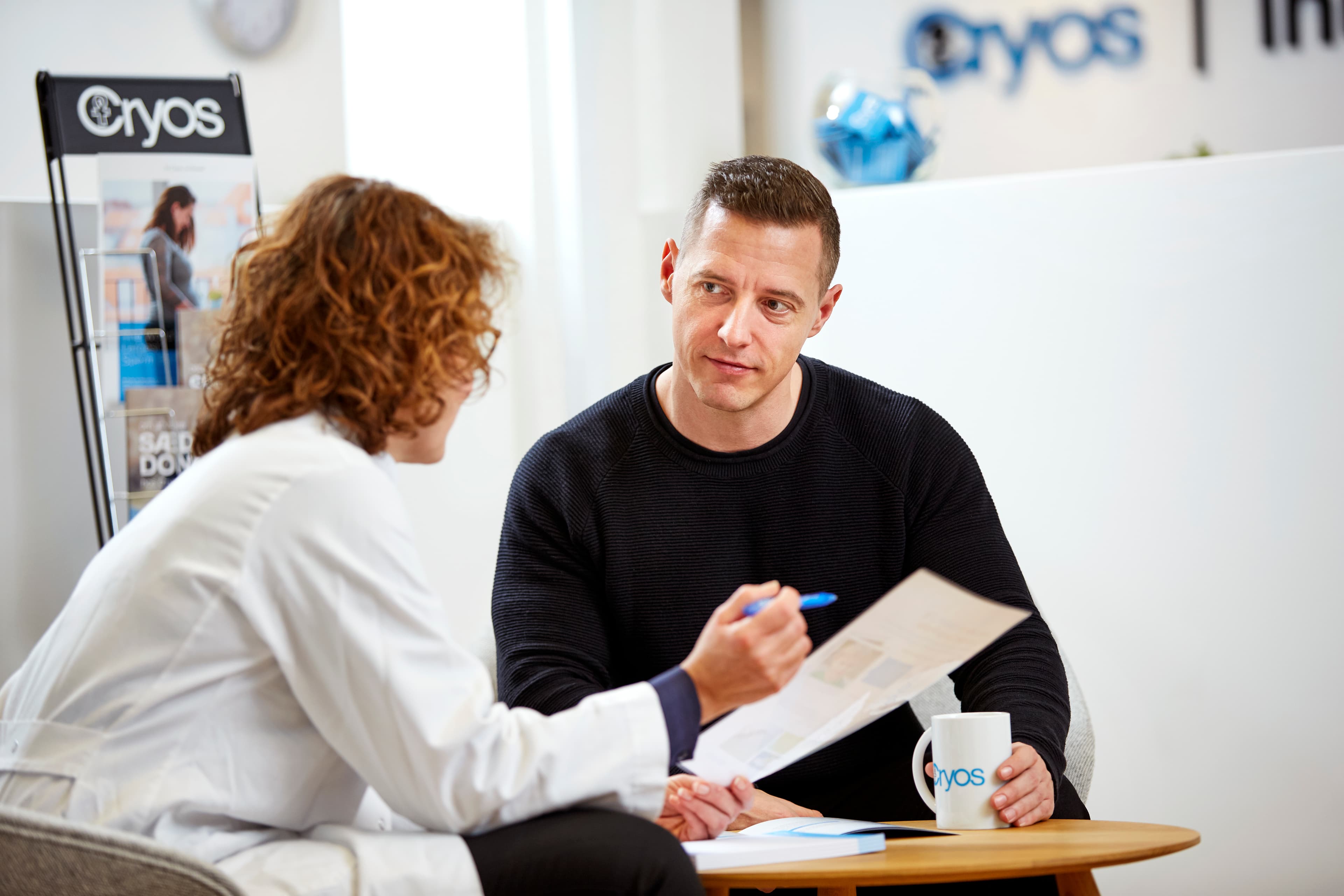 Cryos nurse explaining sperm donation process at Cryos Cryos nurse explaining sperm donation process at Cryos