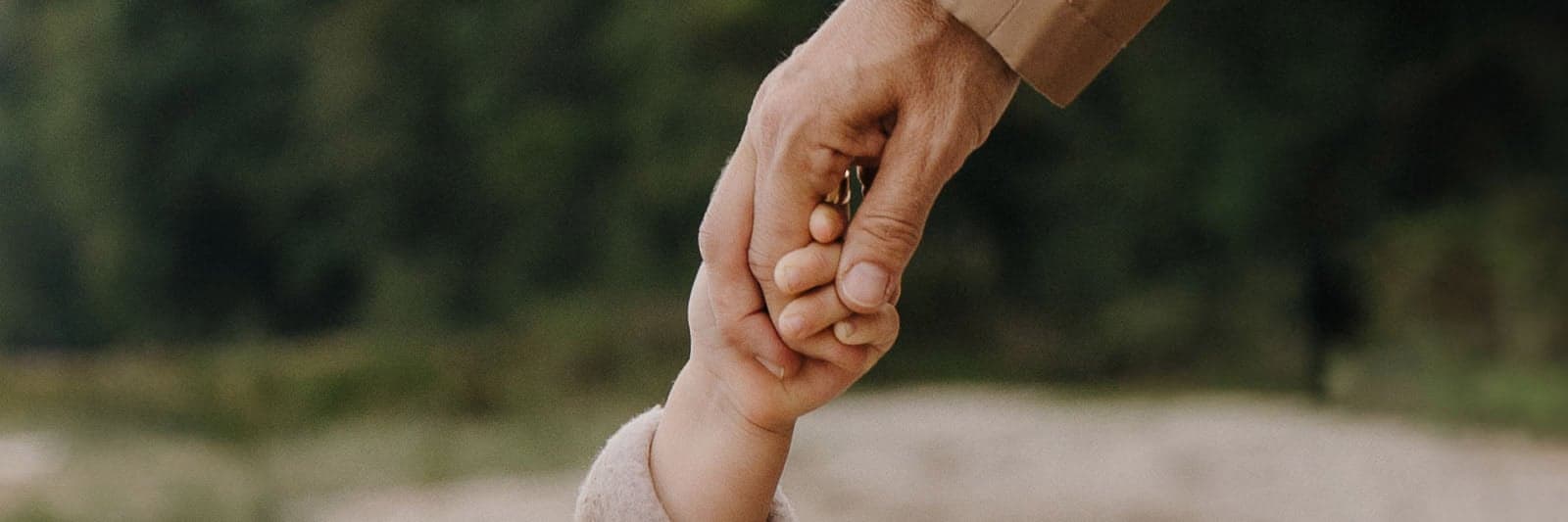 Child and mother holding hands Child and mother holding hands