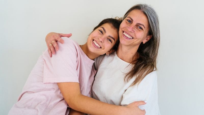 Two women in a relationship having reciprocal IVF treatment