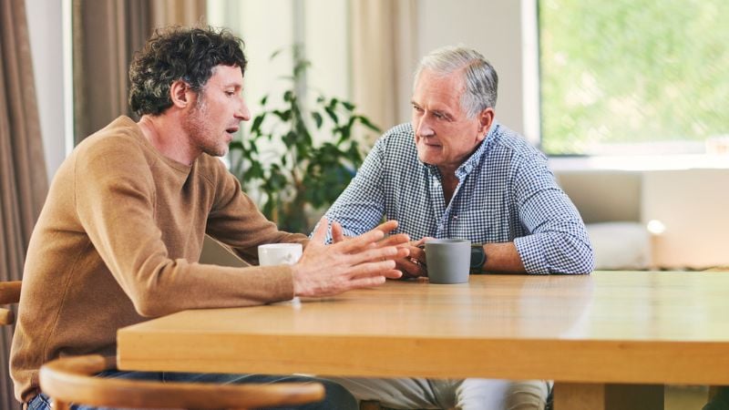 Man talking about fertility treatment with his father