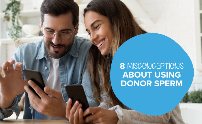 Two persons reading about using donor sperm