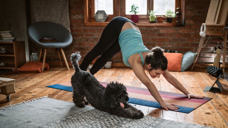 Single mother by choice working out with her dog