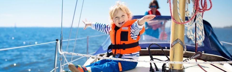 A happy donor-conceived child on a boat