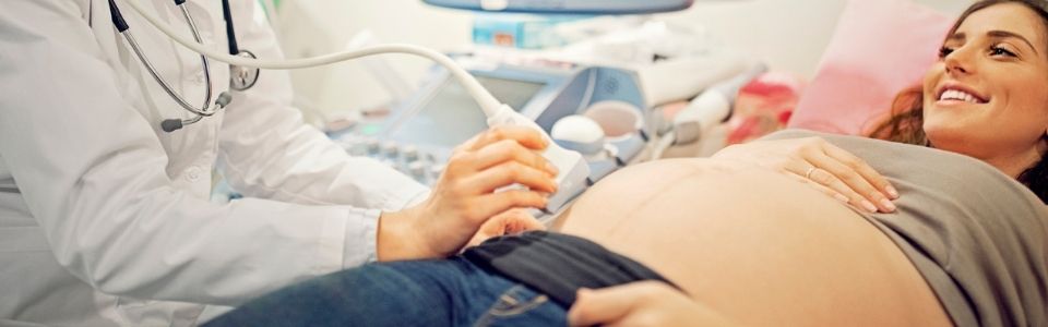 Ultrasound with a woman receiving fertility treatment