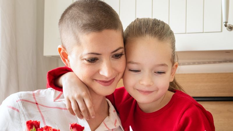 Donor-conceived child and her mother who is a cancer survivor