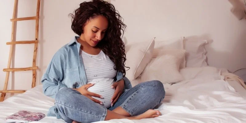 A pregnant woman after receiving fertility treatment with donor eggs