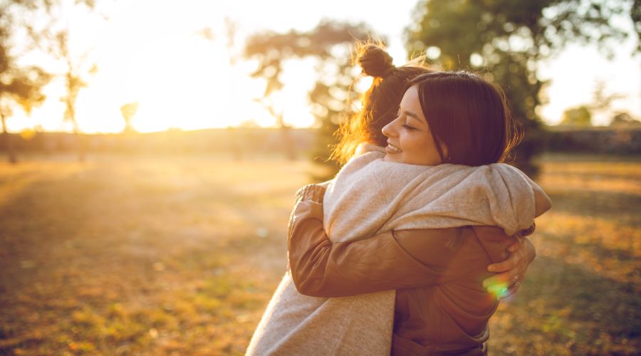 Grateful woman hugging Cryos egg donor