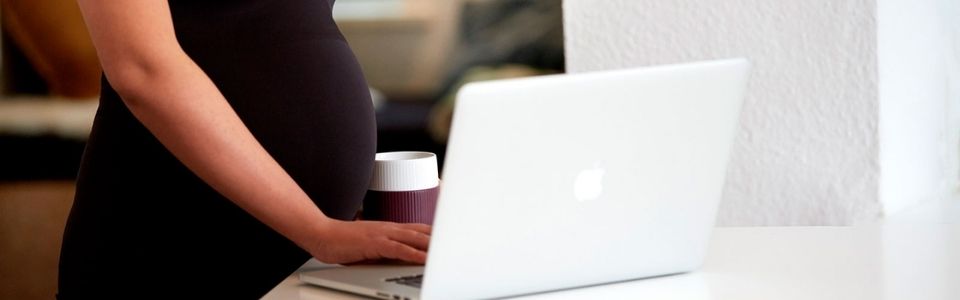 A pregnant woman reporting her pregnancy