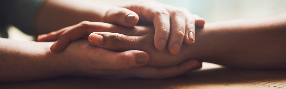 A couple holding hands