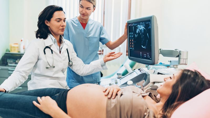 Fertility doctor checking pregnancy Fertility doctor checking pregnancy