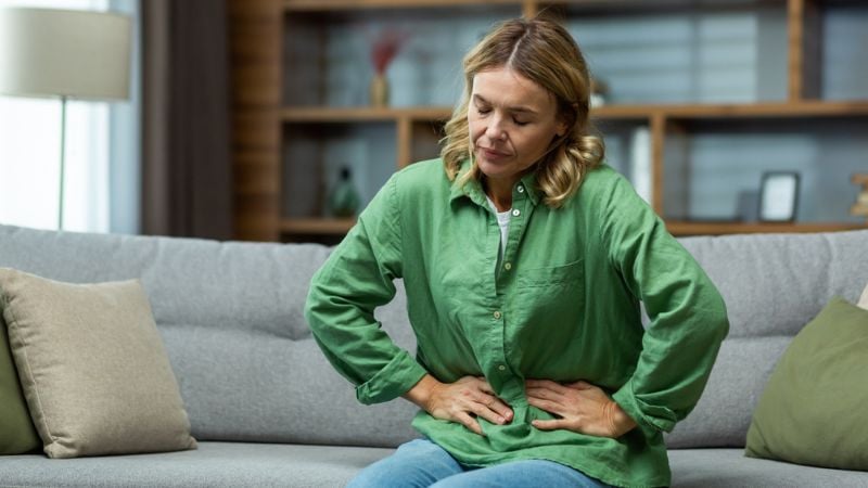 Woman struggling with early menopause Woman struggling with early menopause