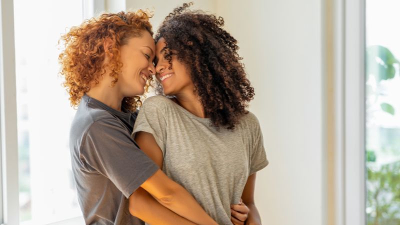 A happy lesbian couple about to be mothers