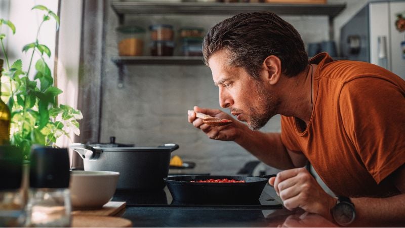 Man cooking dinner Man cooking dinner