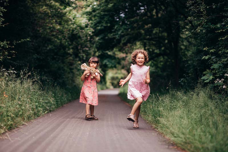 Solo mother Tanja's two girls in the forest