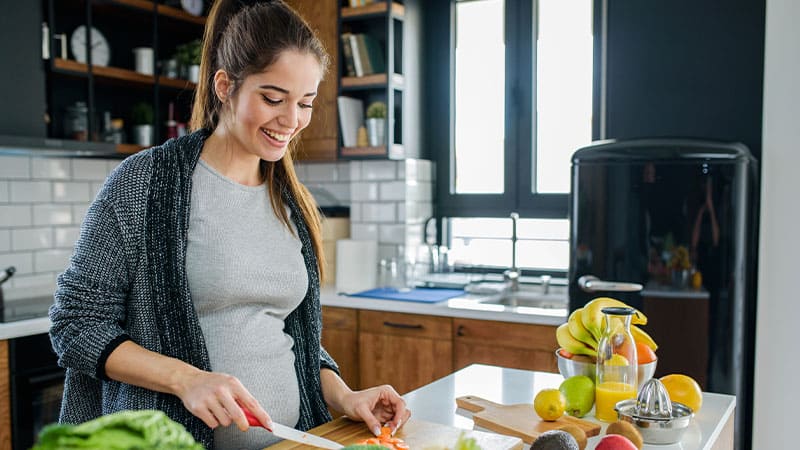 Pregnant woman eating healthy Pregnant woman eating healthy