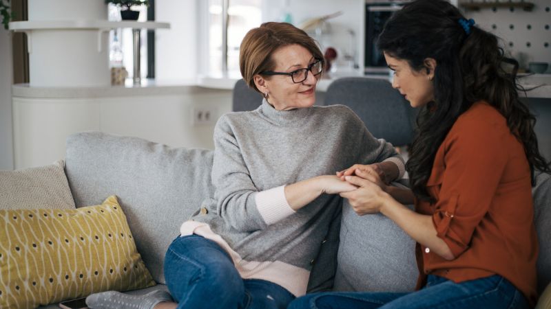 Woman talking about fertility treatment with her mother