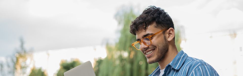 Man looking at his computer
