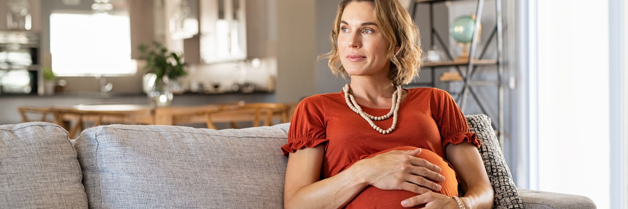 Pregnant women with her hands on her stomach