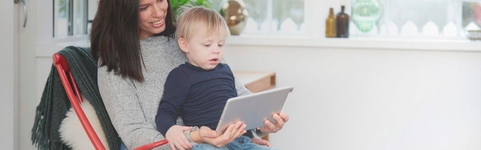 A single mother by choice reading to her child A single mother by choice reading to her child