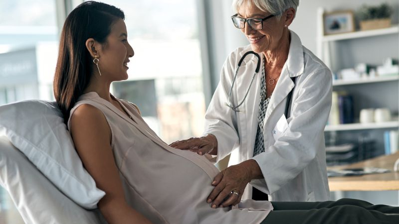 Pregnant woman receiving an examination