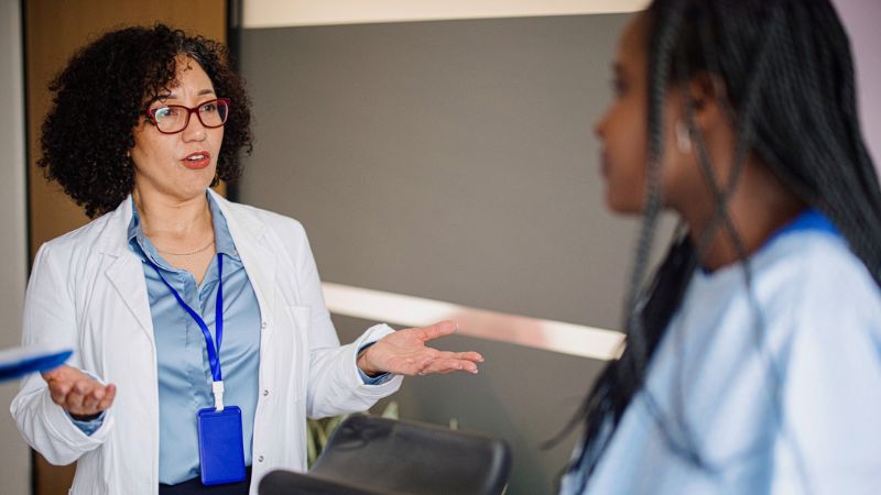 Fertility doctor consulting a patient Fertility doctor consulting a patient