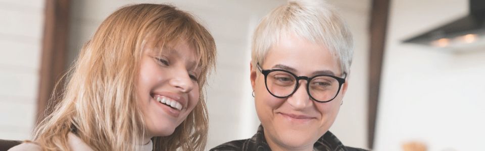 Lesbian couple looking at donor sperm