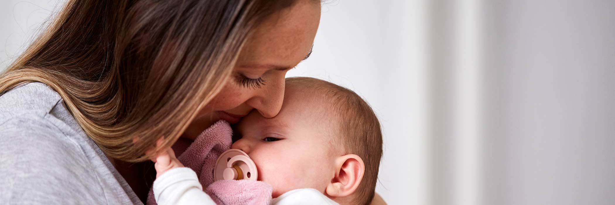 Mother with baby born with donor sperm or eggs