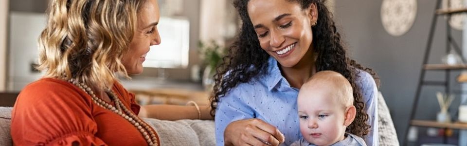 Lesbian couple with their donor-conceived child